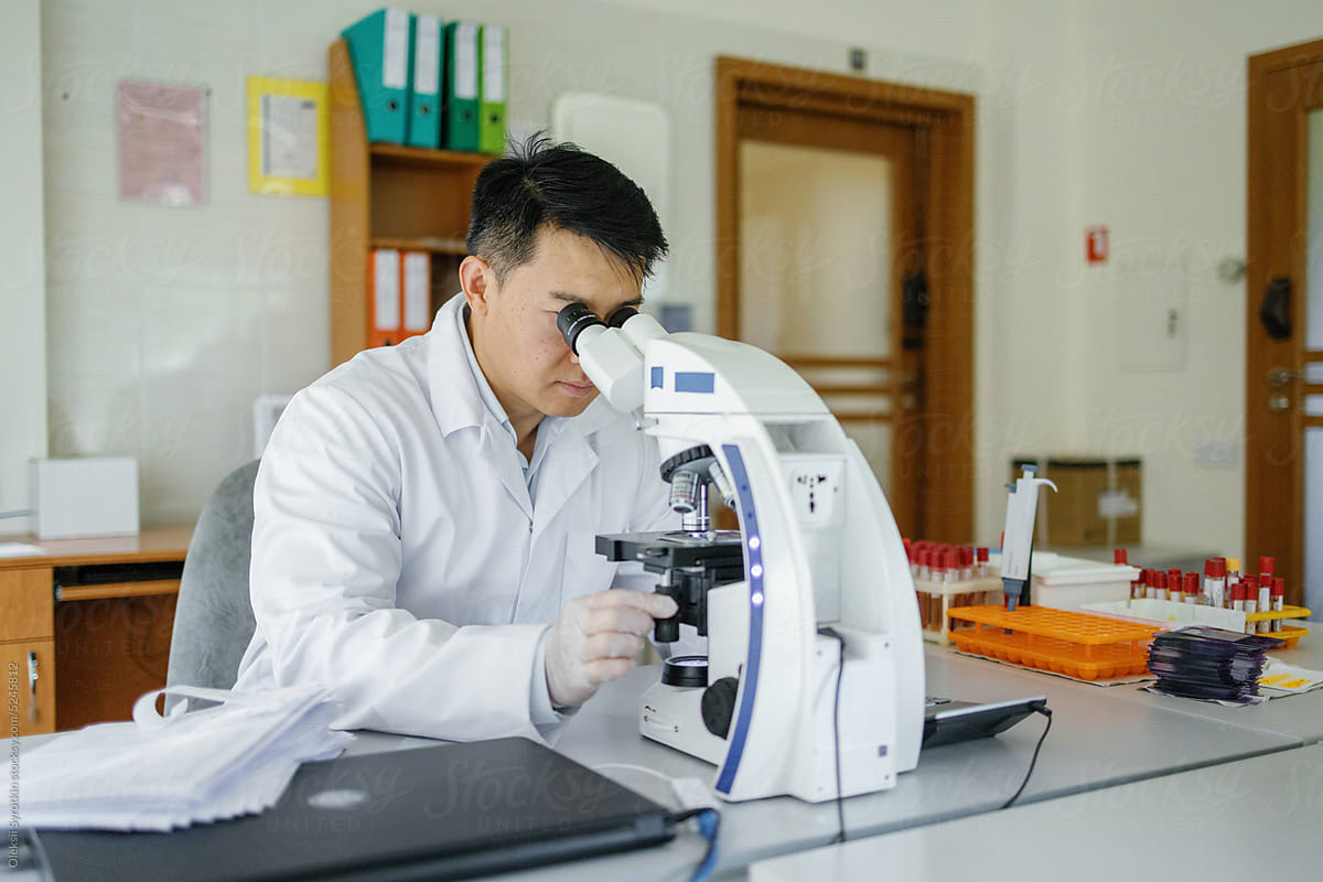 Microscope analysis laboratory worker research clinical