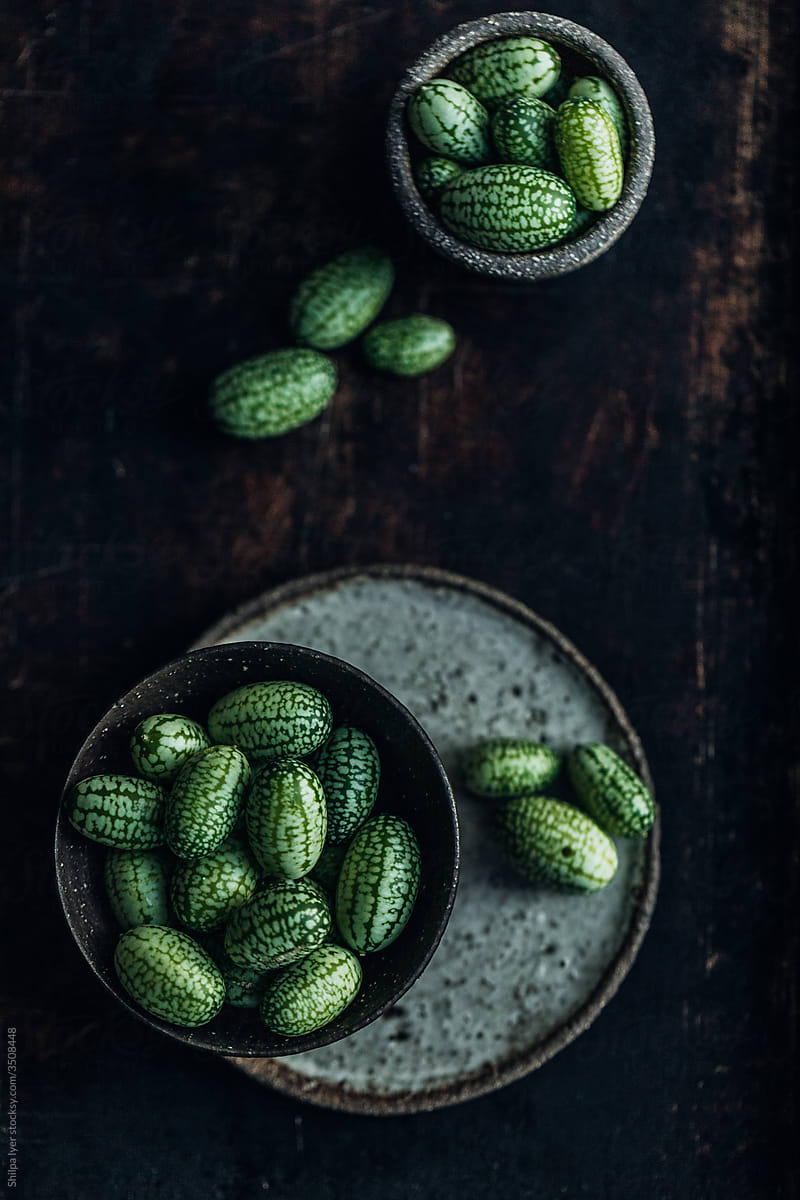 Tiny cucamelons in bowls
