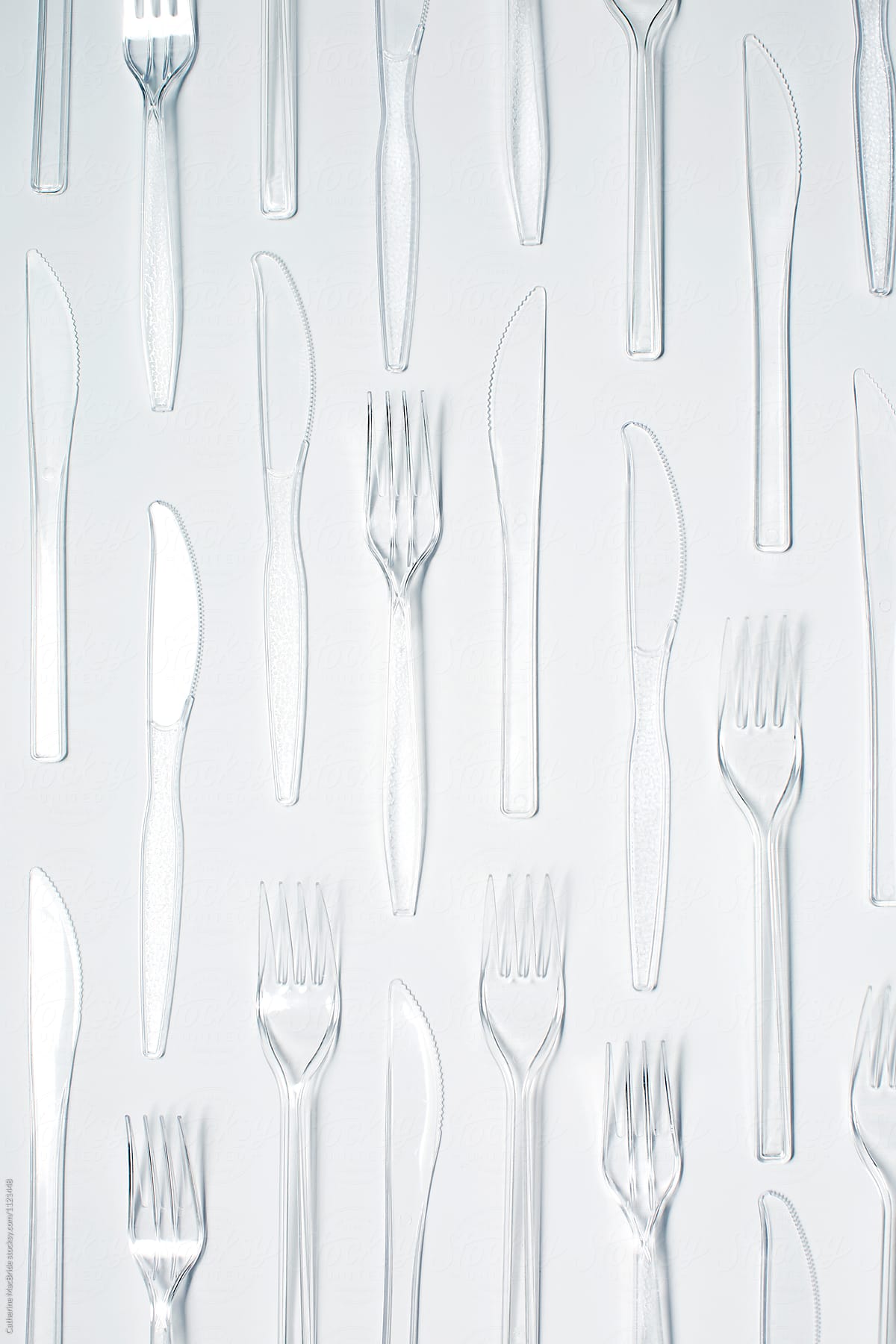 Rows of Plastic cutlery