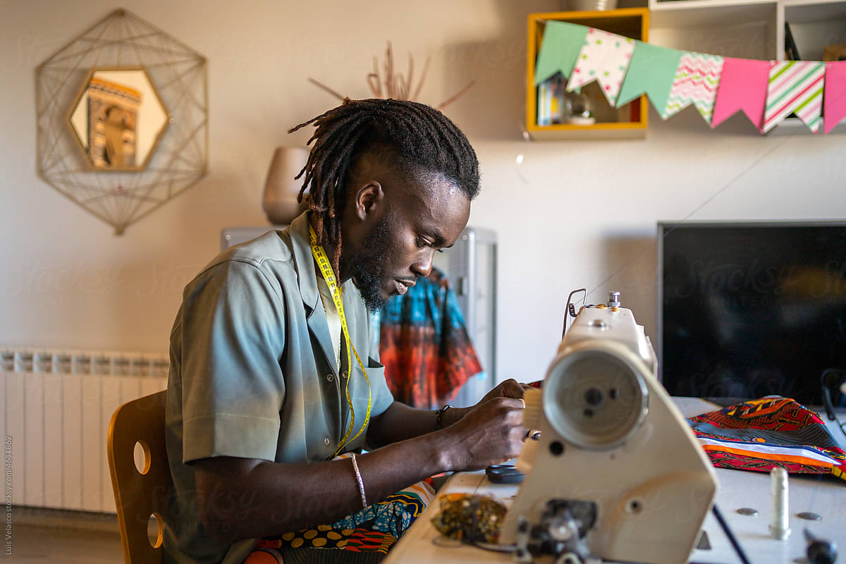 Black Man Entrepreneur Tailor Working In A Fashion Design Studio.