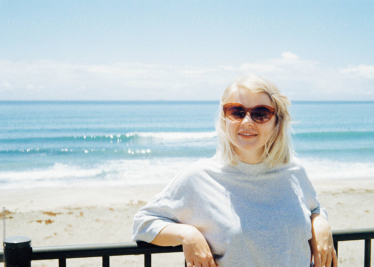 Blonde woman by the sea