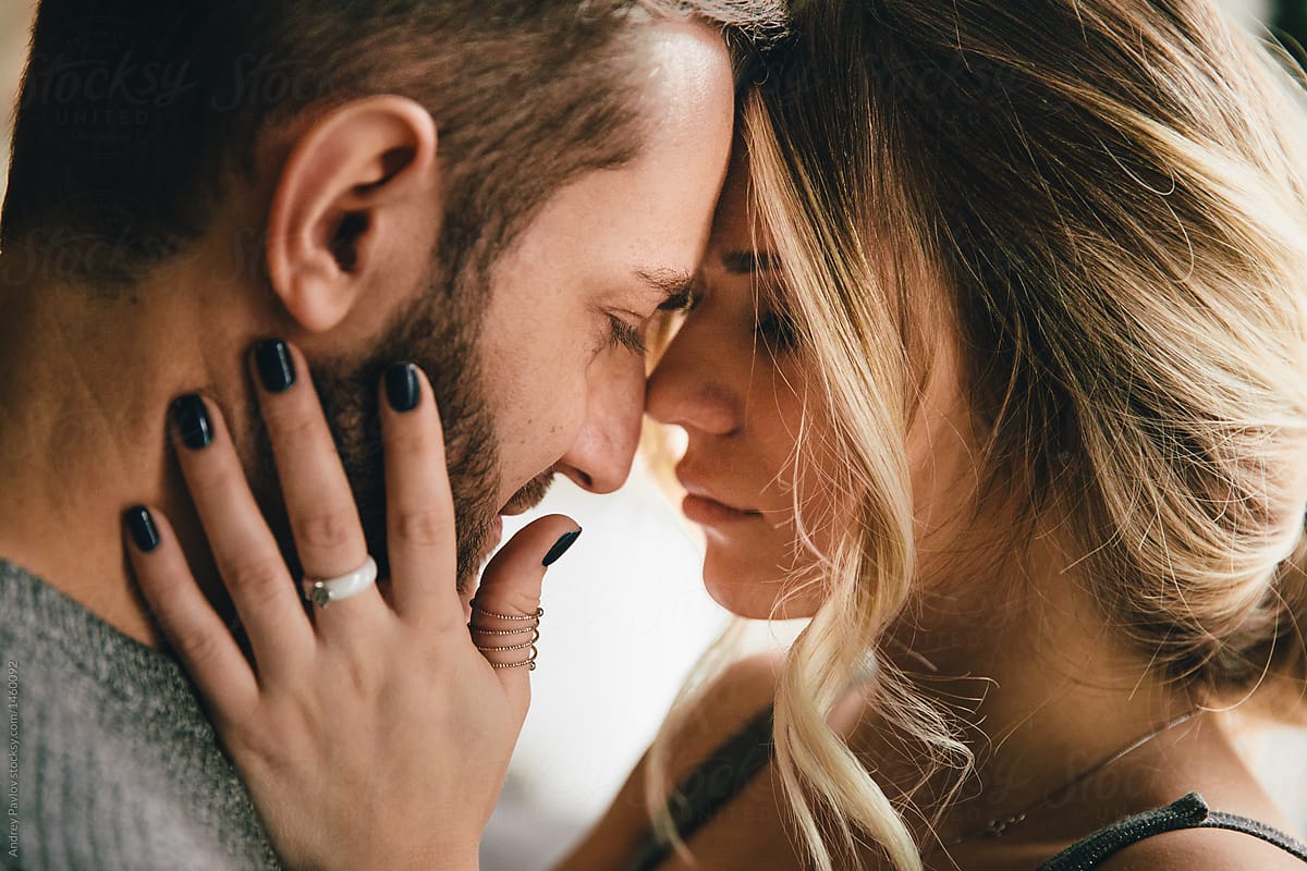 Closeup View Of Couple Kissing By Stocksy Contributor Andrey Pavlov