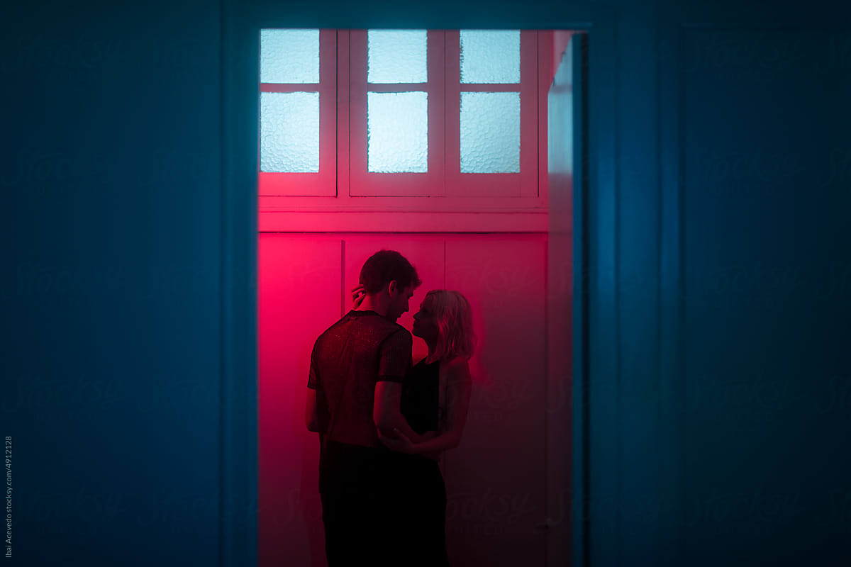 Surreal portrait of loving couple together at the party
