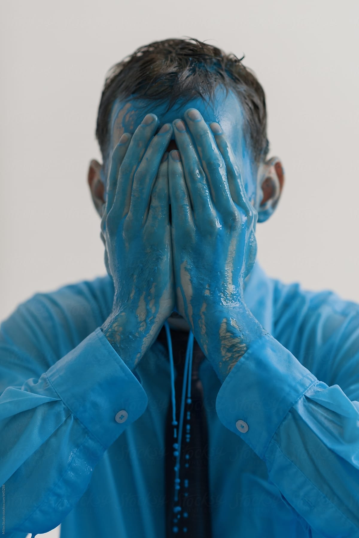 Businessman Portrait in blue paint