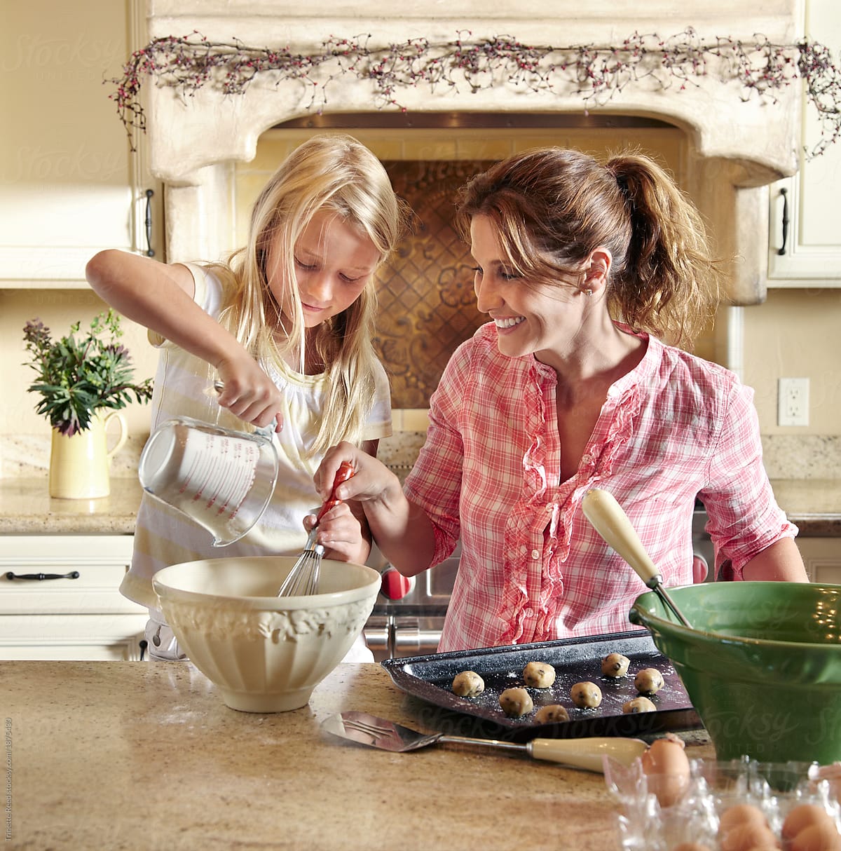 mother-and-daughter-baking-together-in-the-kitchen-portrinette-reed