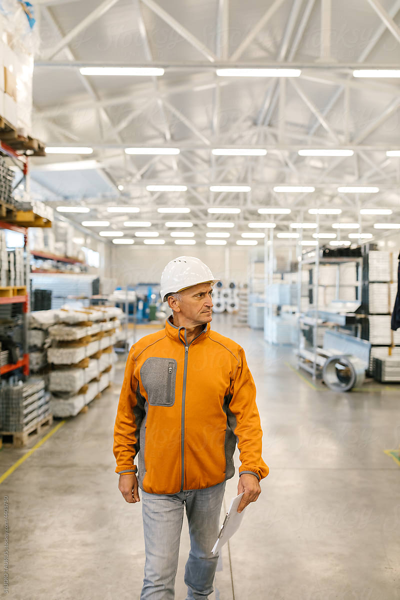 Senior Man In Inspection In A Factory