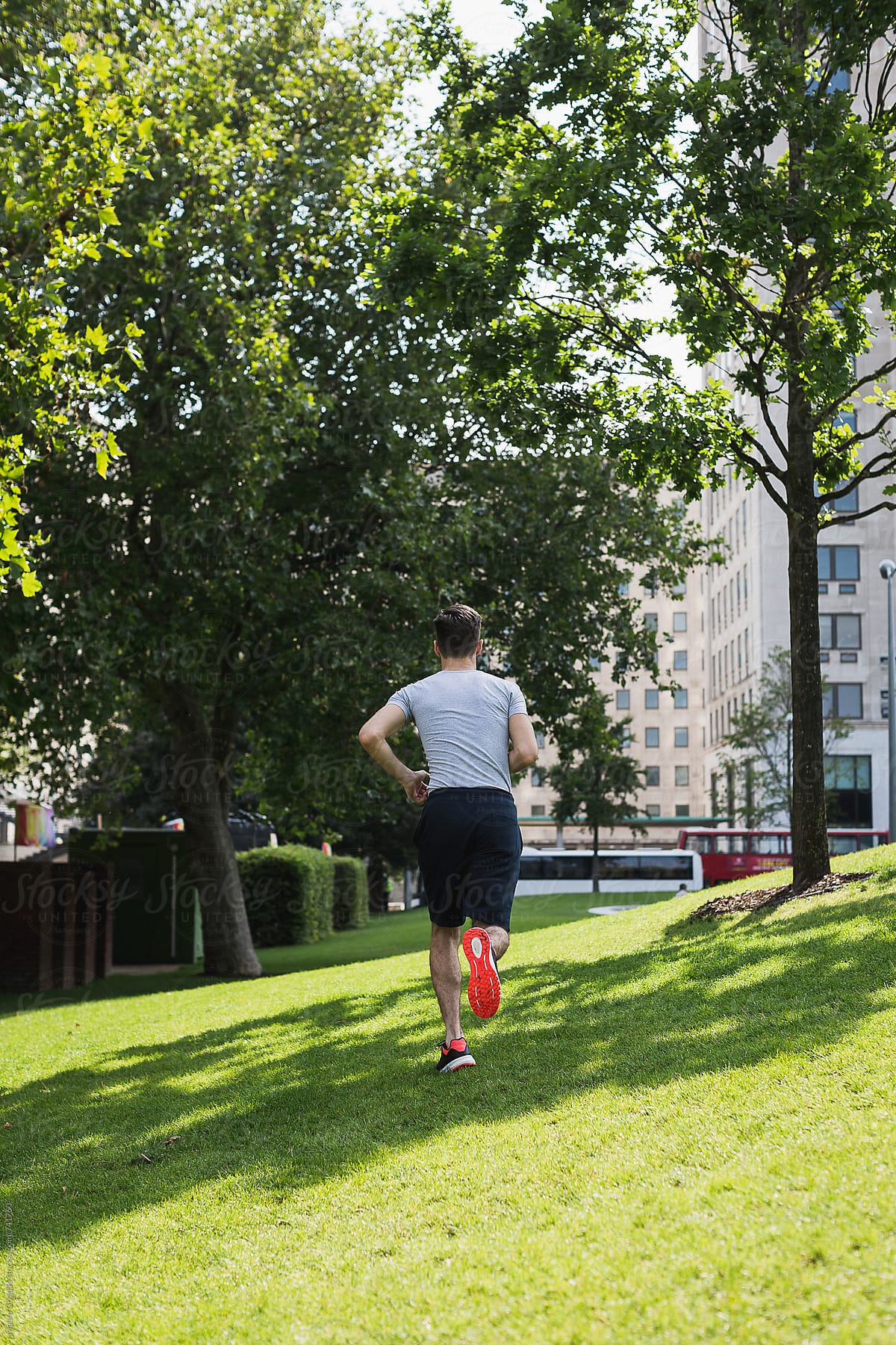 Man running in the city park