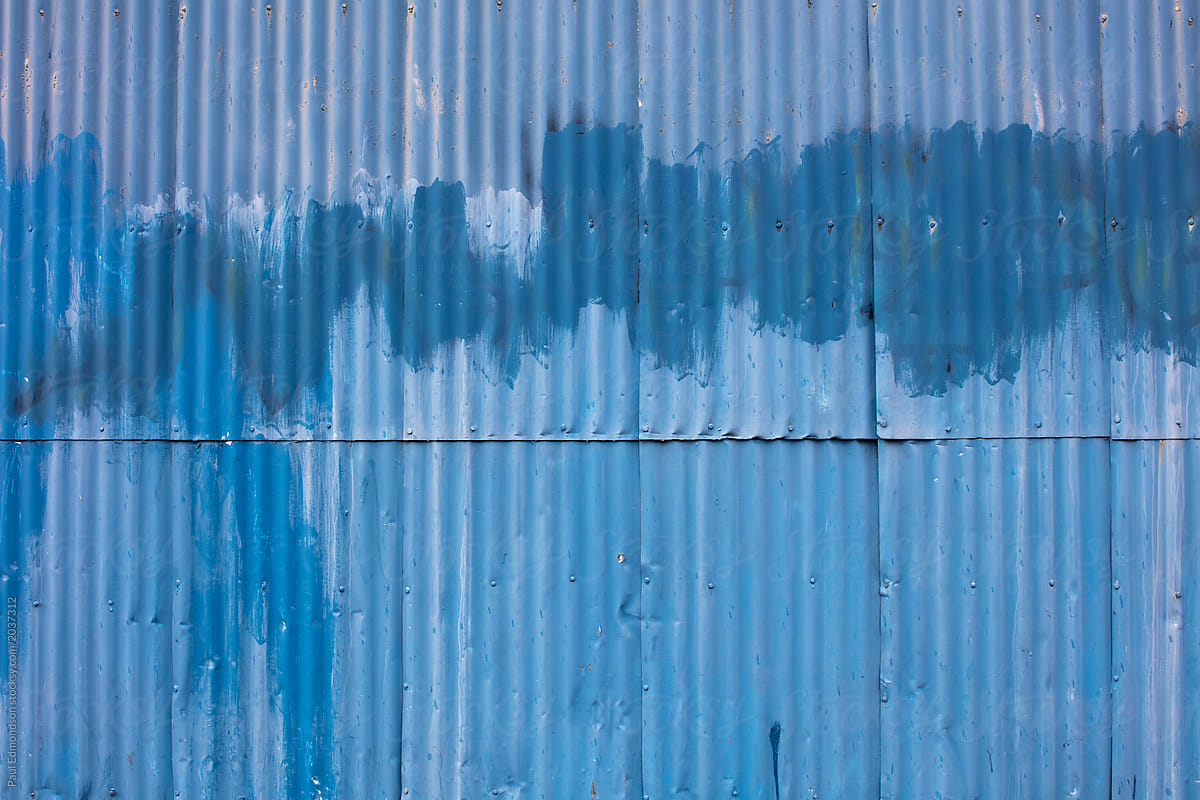 Painted blue warehouse wall