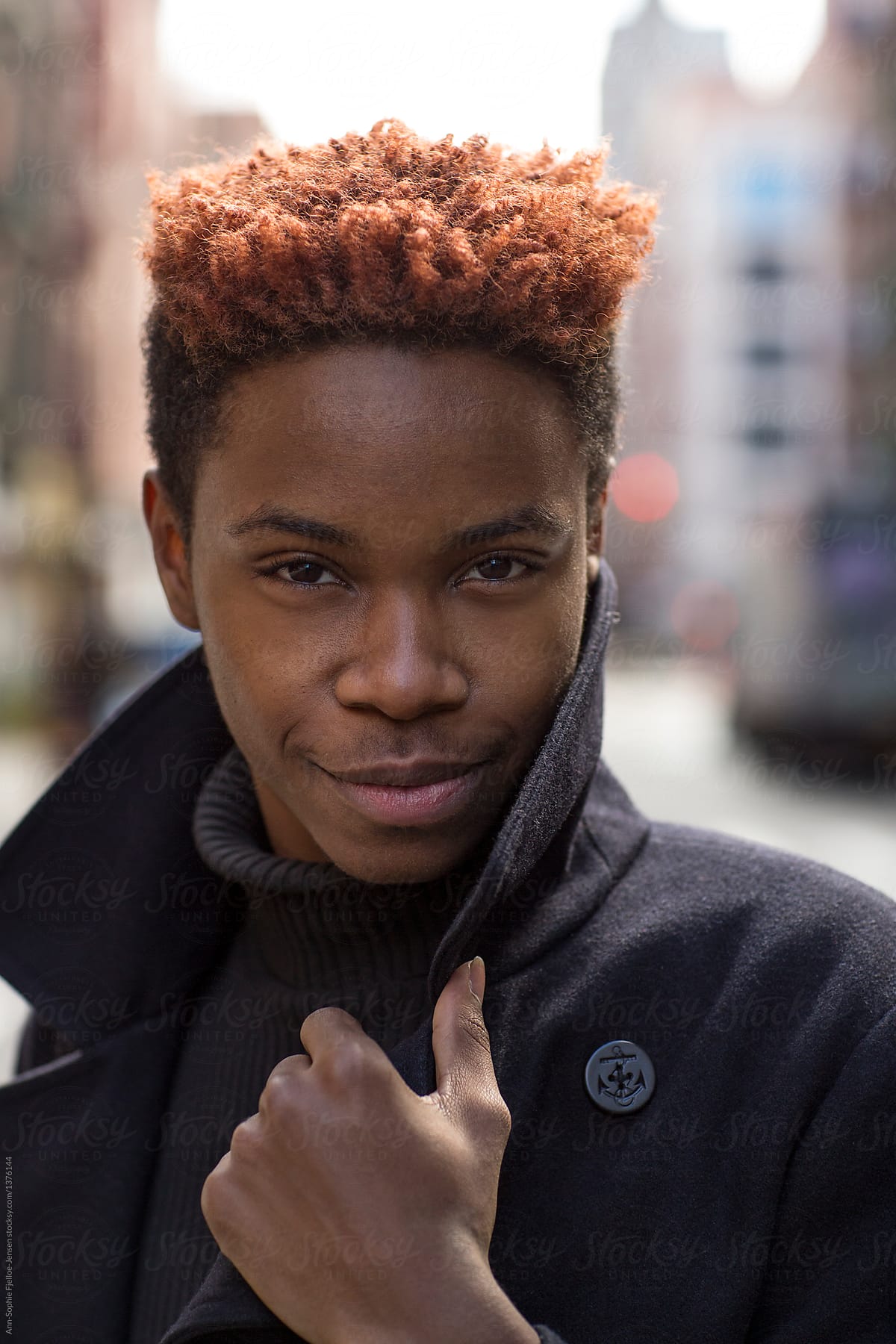 A Young Black Man With Red Hair.