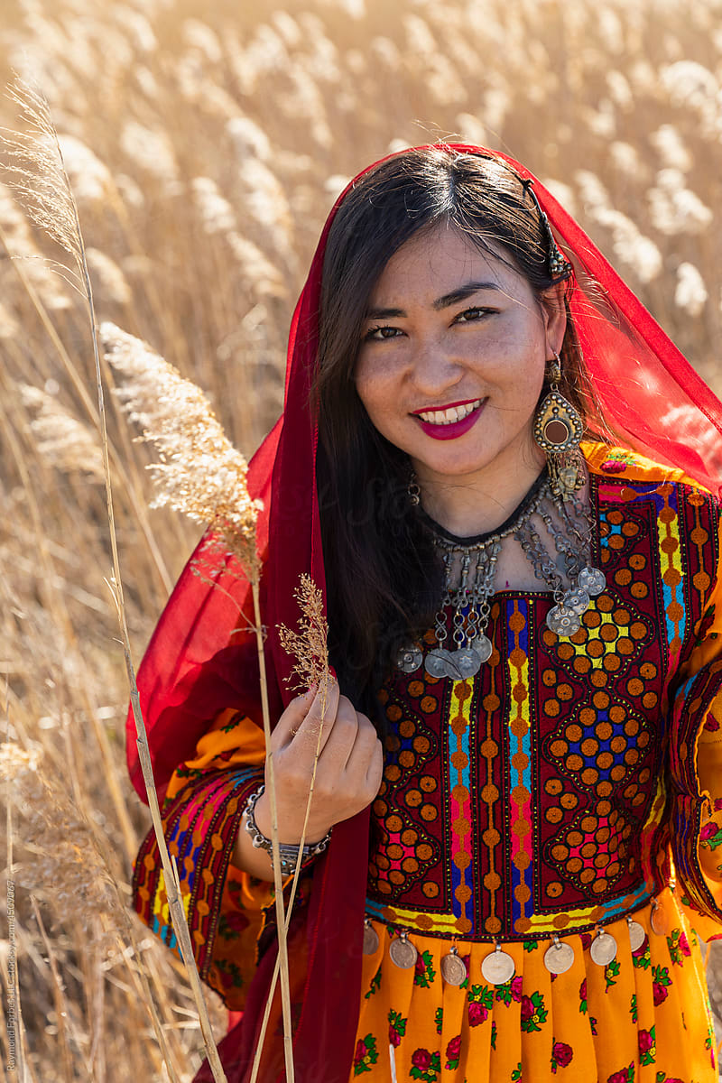Young Afghani Woman Portrait in Traditional Dress  outdoors
