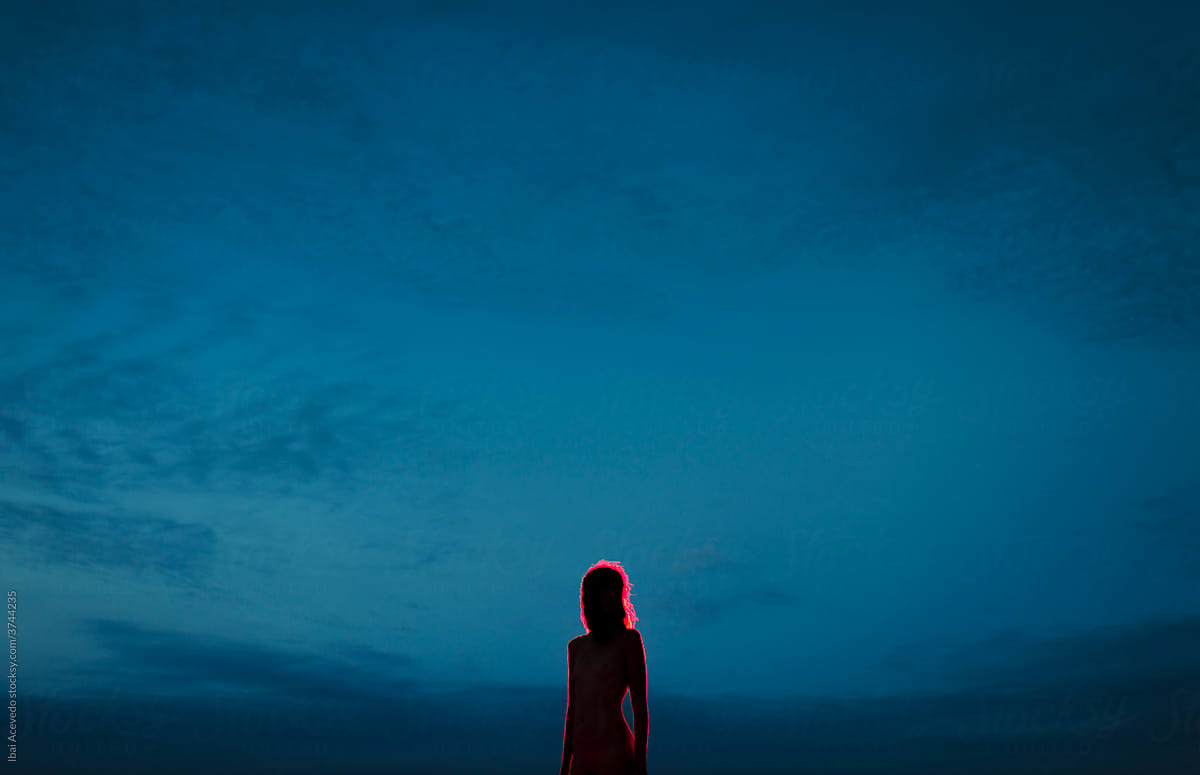 Black and red silhouette with blue dark sky