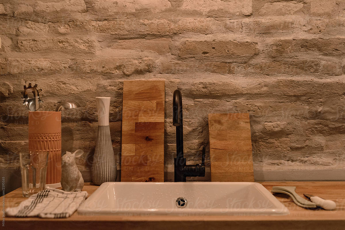 Sink with wooden boards in kitchen