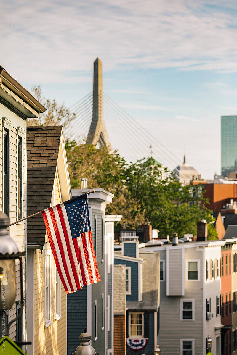 View American Flag with   Zakim Bridge Boston, Massachusetts