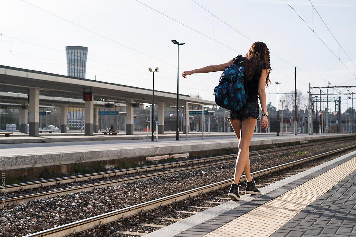 Young woman traveling in railway station