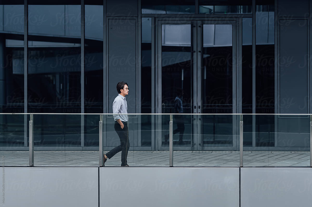 Businessman walking in office building