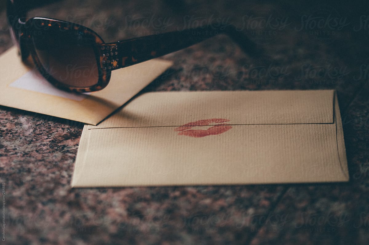 An Envelope With A Kiss Mark On The Back By Stocksy Contributor