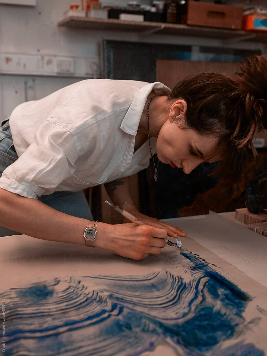 Business woman art making process on canvas