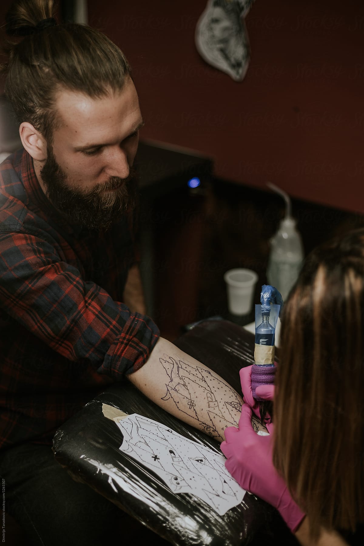 Man in tattoo studio