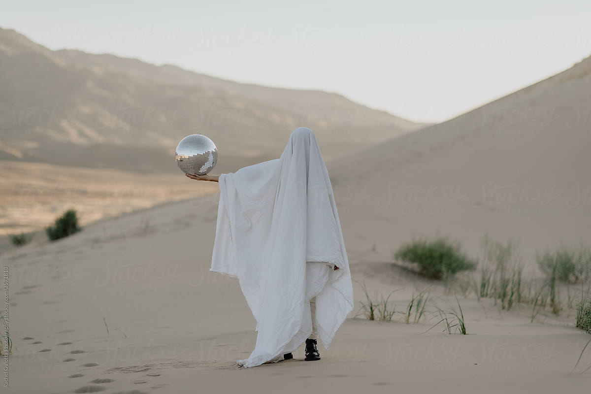 Desert Ghost Holding a Disco Ball