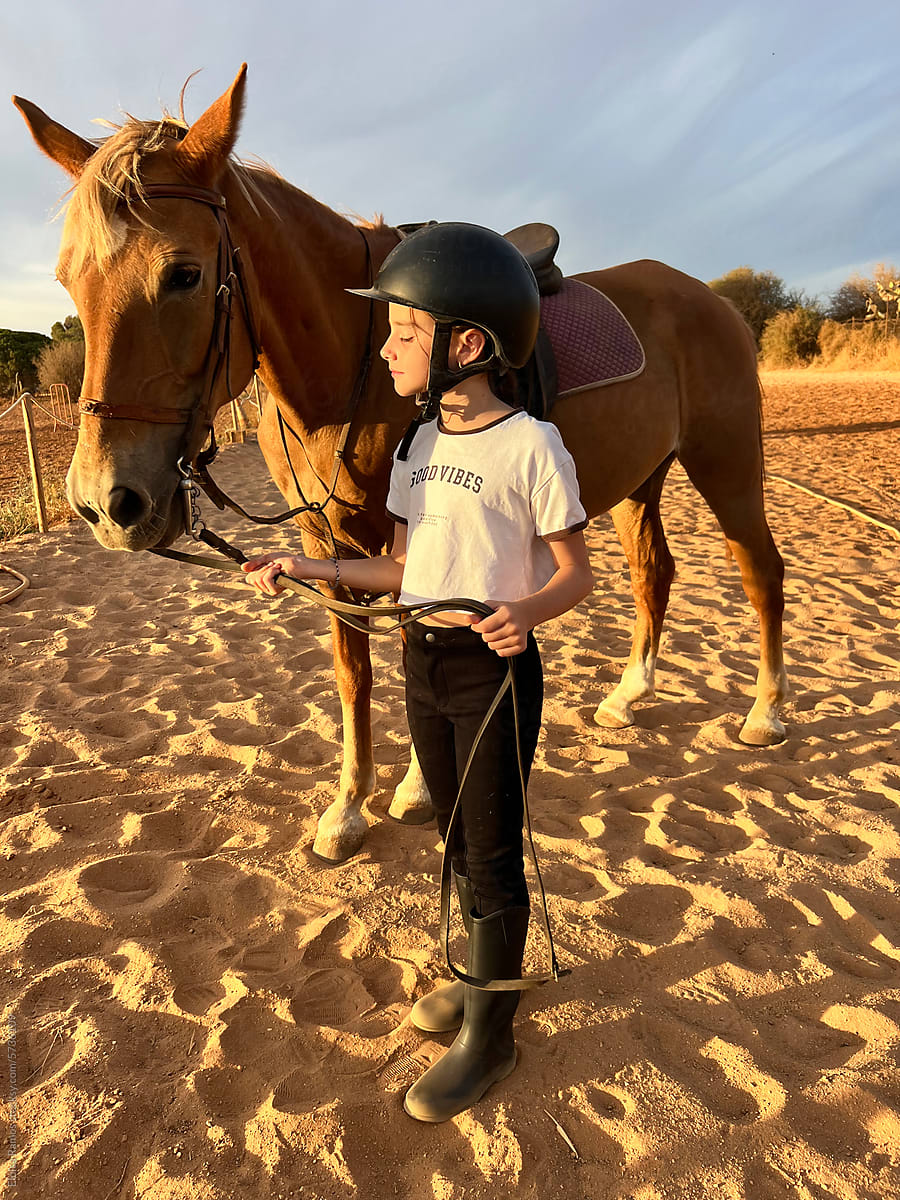 young rider with horse
