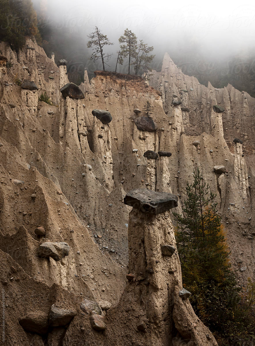 surreal earth Pyramids in mist