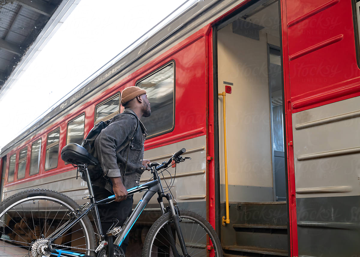 Man With Bicycle Going To The Train