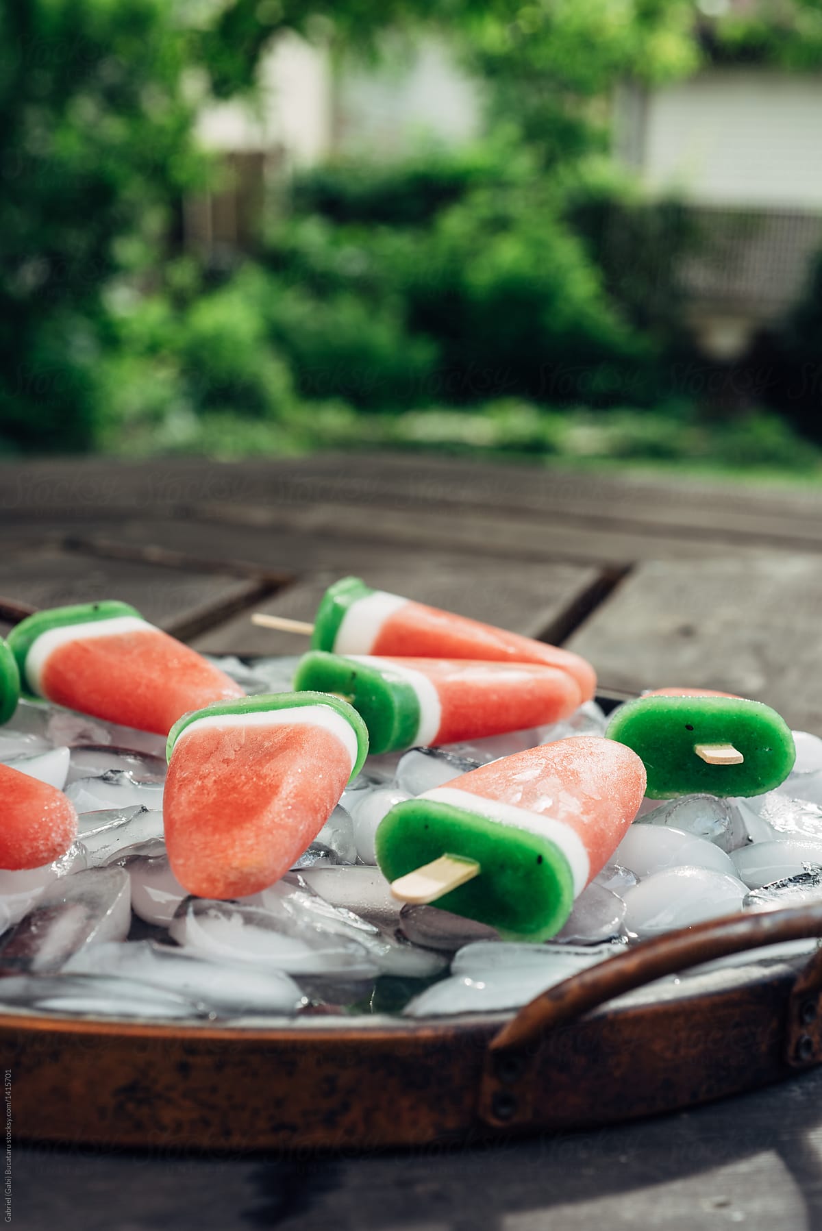 Watermelon popsicles on a tray