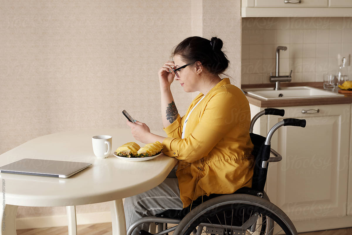 Woman With Paralysis Using Smartphone