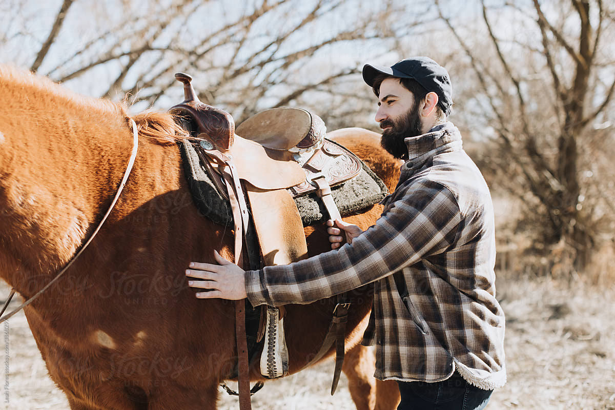 A Farmer Pets His Horse