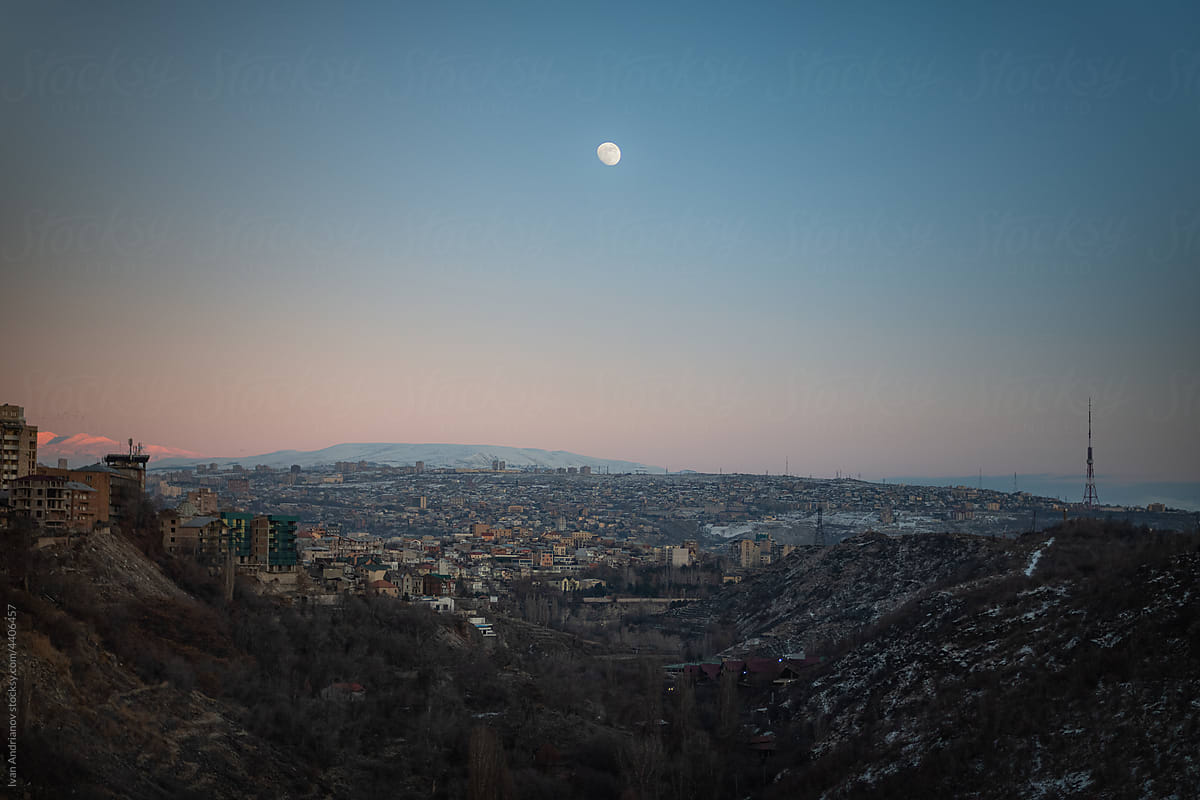 Evening City Panorama With Moon
