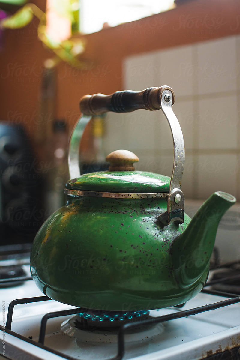 Green kettle on the burner