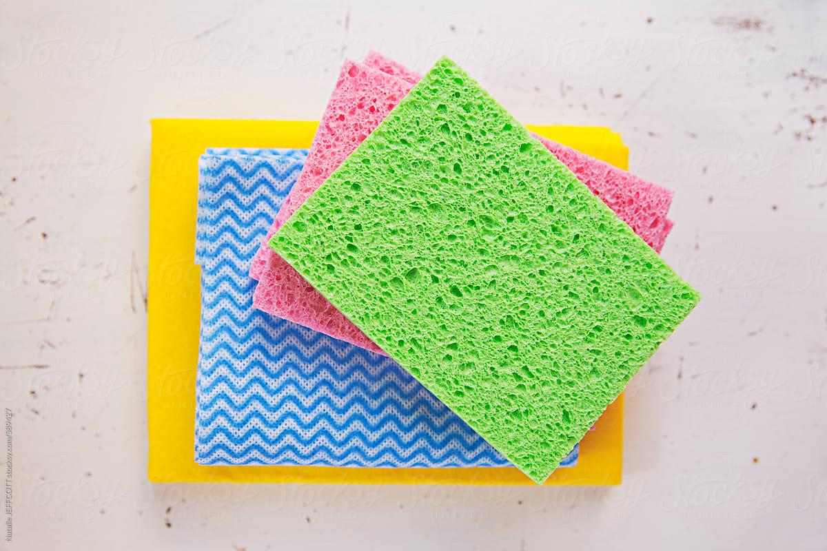 colourful sponges and cleaning clothes ready for spring cleaning