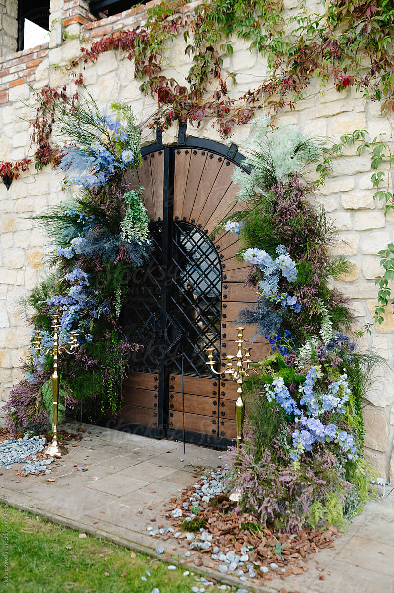 Doors decorated with floral arrangements