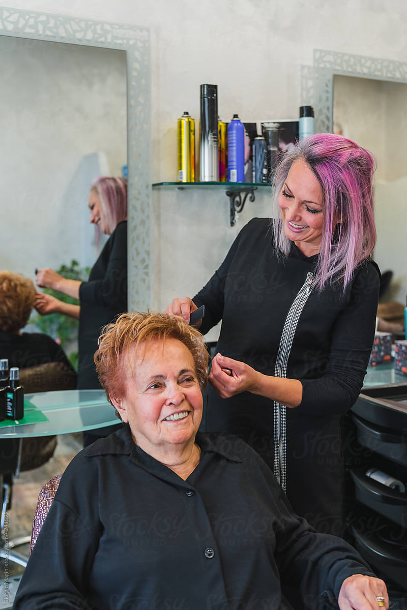 Combing the Hair of an Elderly Woman in a Salon