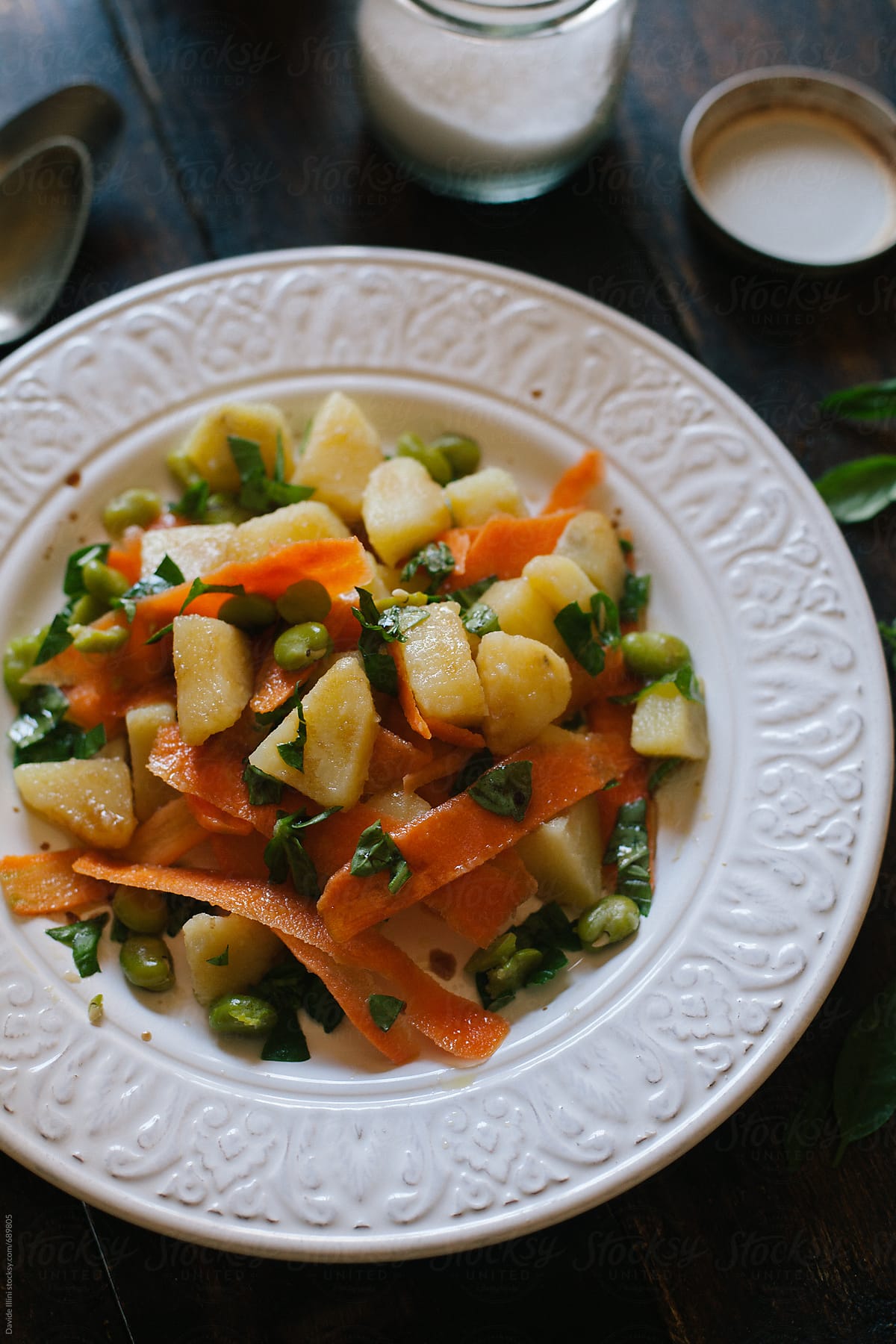 Vegan salad with potatoes green beans and carrots.