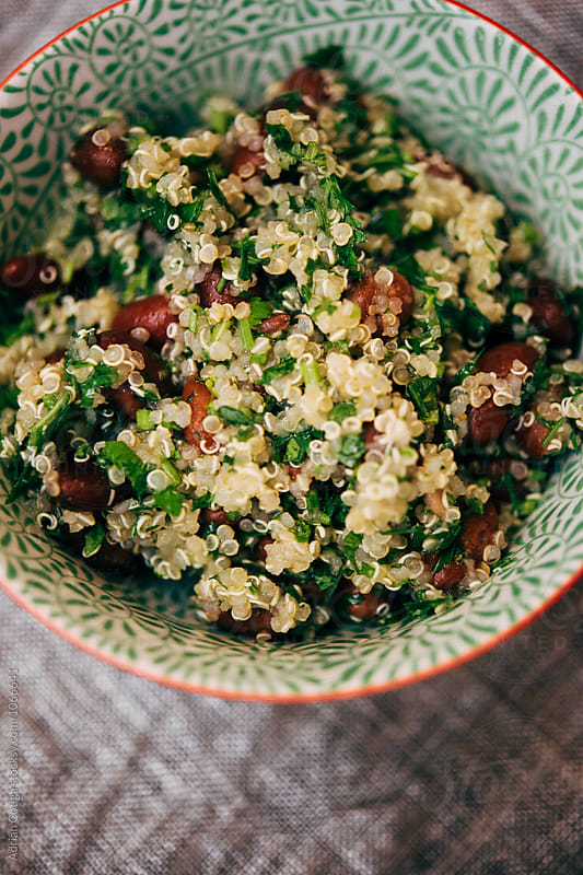 Healthy quinoa salad ; Tabbouleh salad with quinoa, tomatoes and parsley
