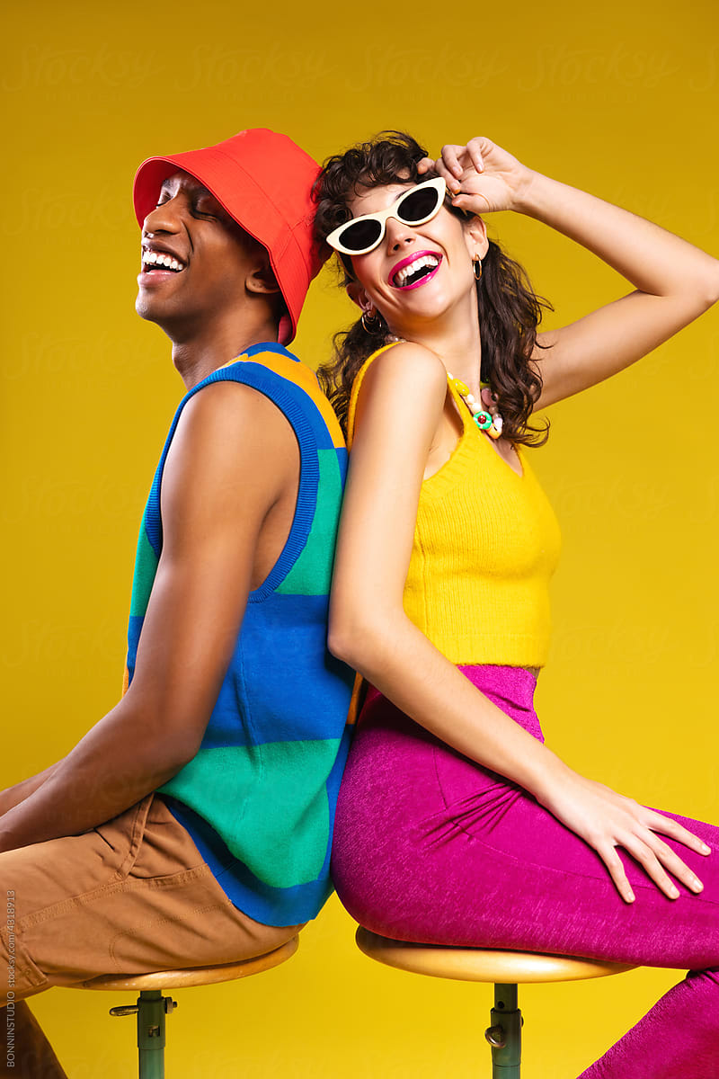 Cheerful diverse models in vintage clothes