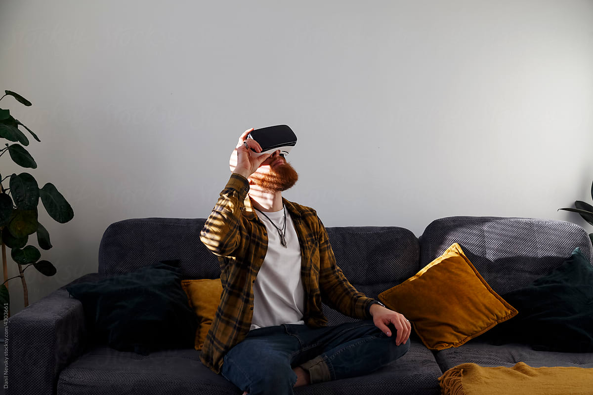 Man enjoying virtual reality in headset