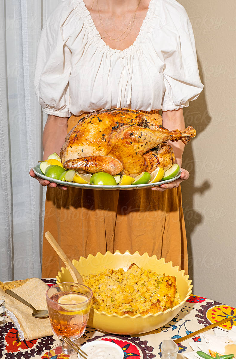 Woman Serving Thanksgiving Turkey