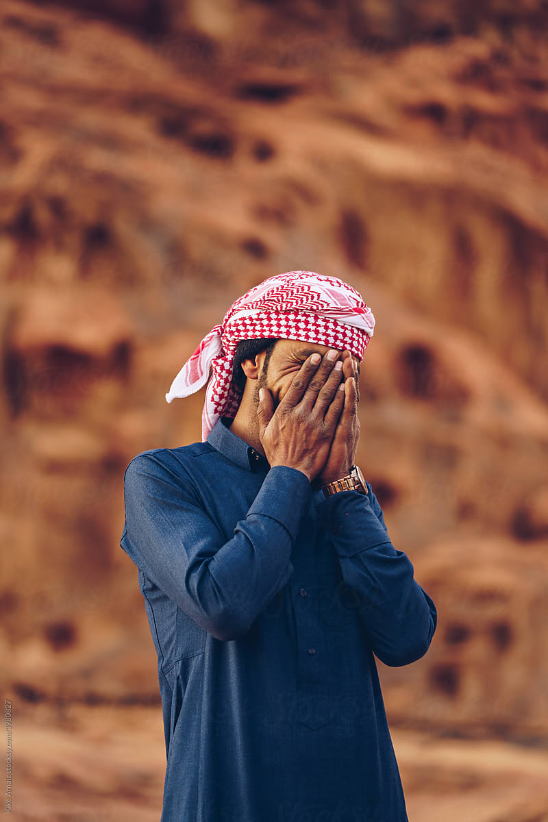 Arabic man standing near mountains