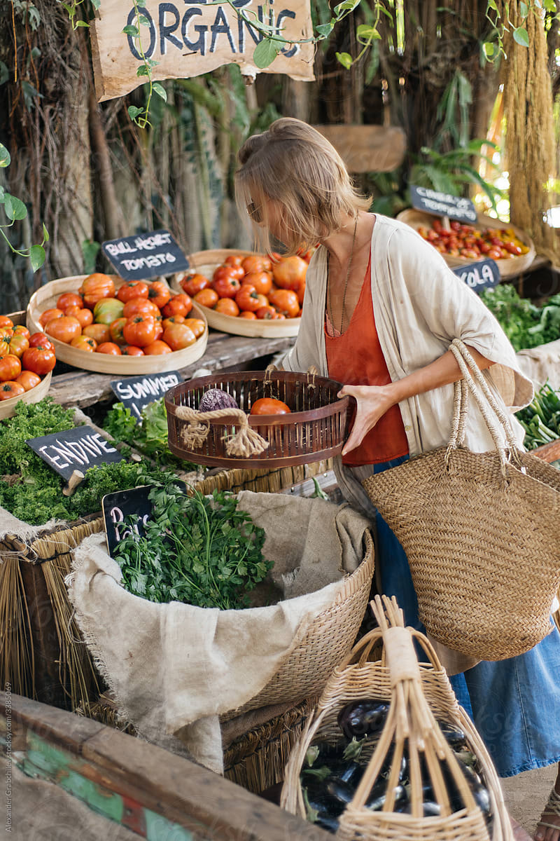Woman Shopping Organic Food in a Farmer Market