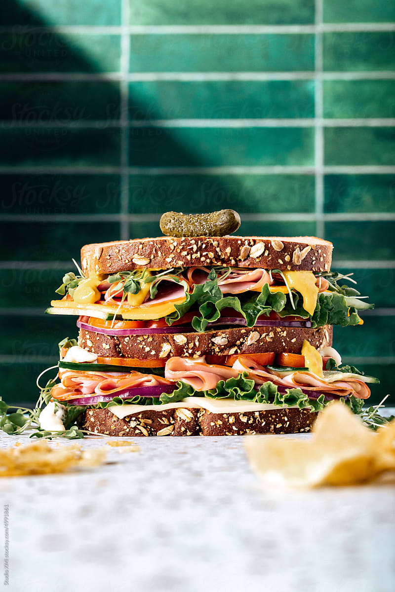 Sandwich with Green Tile Background and Chips
