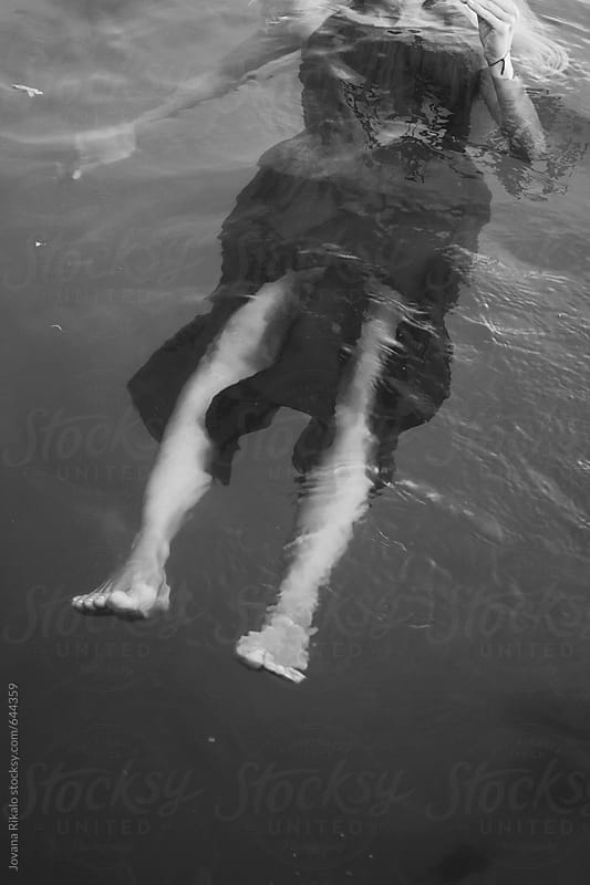 Young Woman Floating On Water By Jovana Rikalo Stocksy United 