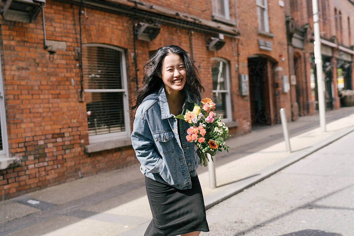 Happy Asian Woman Shopping Flowers