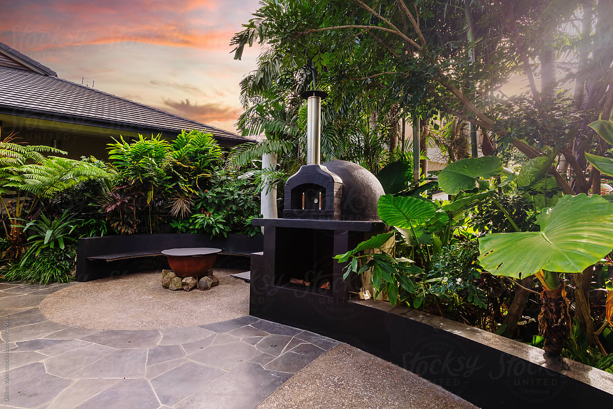 garden with pizza oven and fire pit