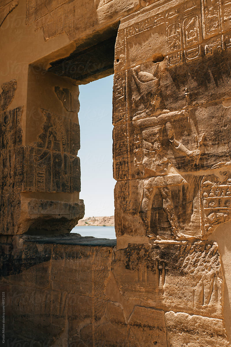 Window in wall of Temple of Philae with adjacent carving