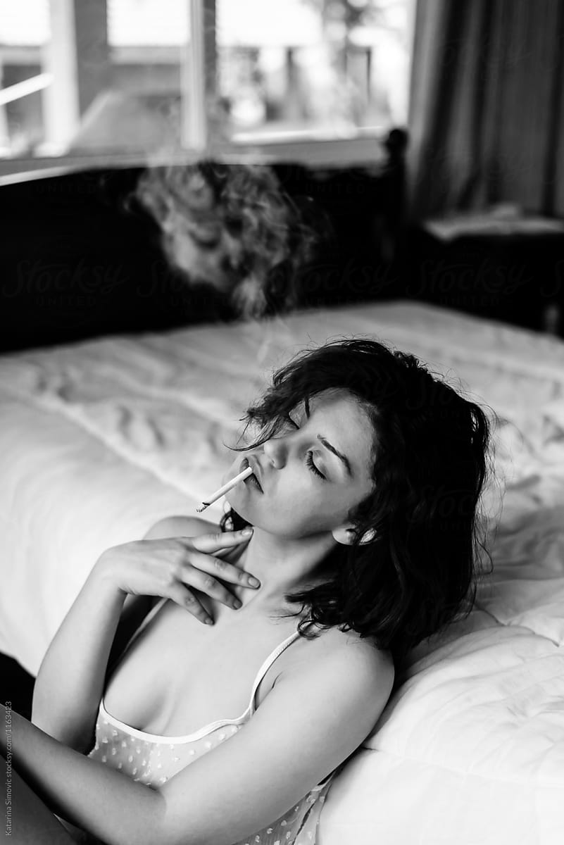 Sexy woman smoking cigarette
