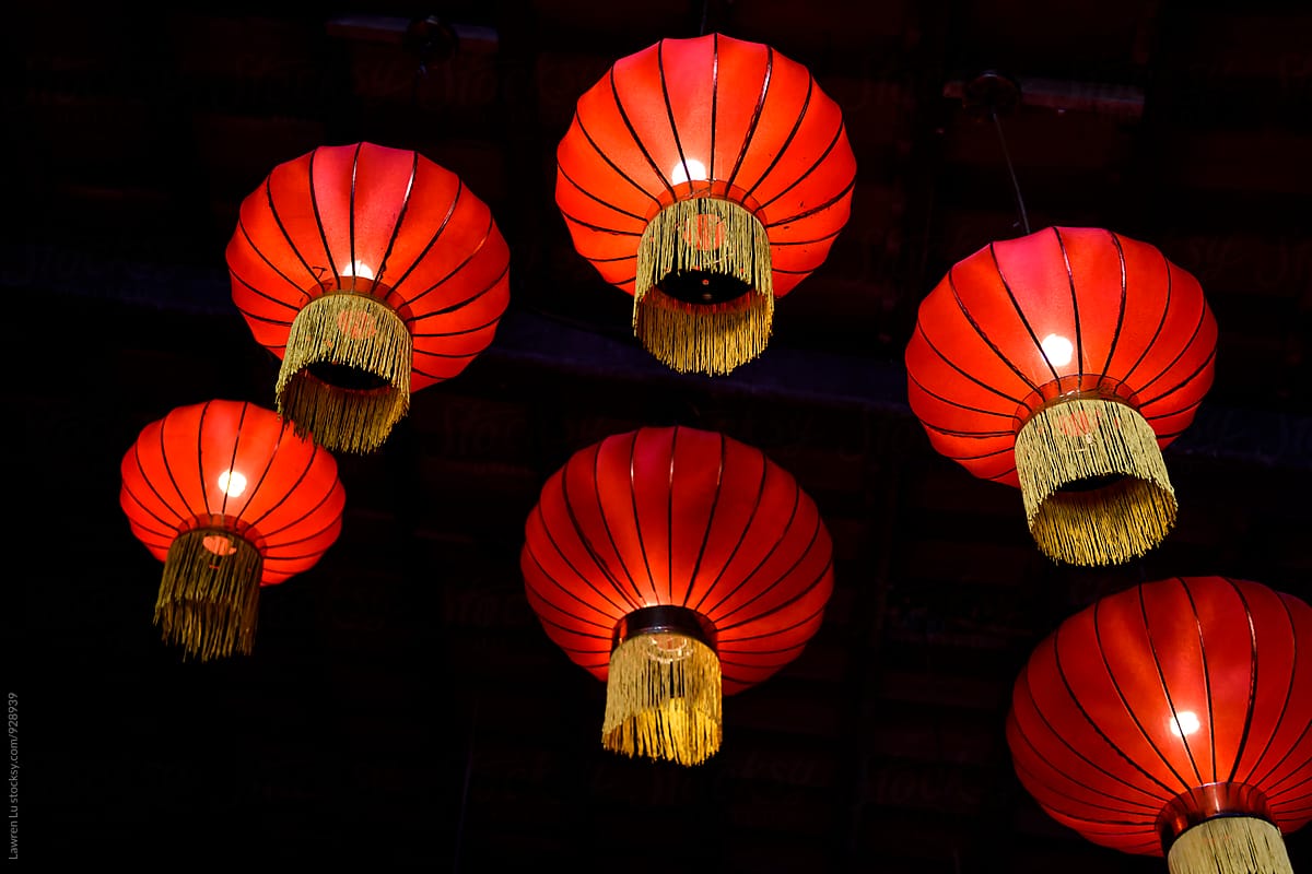 red paper chinese lanterns hanging on ceiling