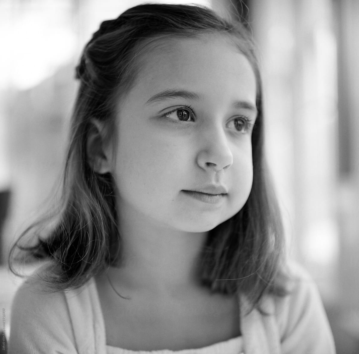 Black And White Portrait Of A Beautiful Girl Looking Away By Stocksy Contributor Jakob 