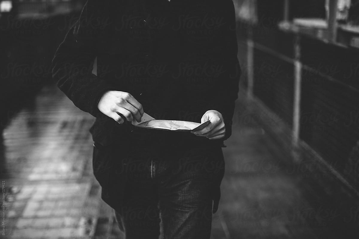 Man Opening an Envelope in Black and White